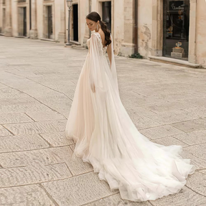 Luxury A-Line Tulle Wedding Dress with Beading Appliques and Backless Design