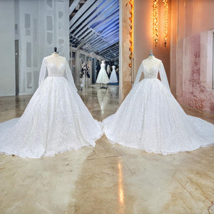 Crystal Beaded Shining Ball Gown Wedding Dress with Long Sleeves and Illusion Back