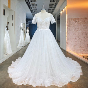 Elegant Short Sleeve A-Line Sequined Wedding Dress with Corset Back