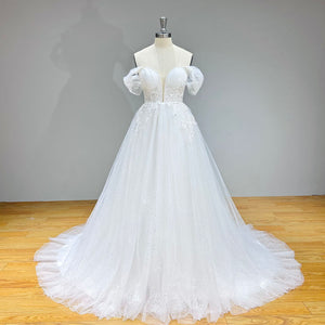 Elegant A-Line Off-Shoulder Wedding Dress with Beading and Appliques