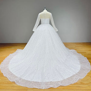 New Arrival Glitter Tulle Ball Gown Wedding Dress with Long Sleeves and Illusion Back