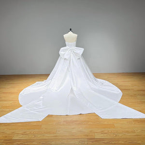 Light Effect Satin Ball Gown with Big Bow Chapel Train Pearls and Pleated Top