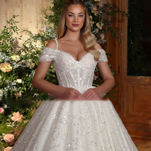 2024 Luxury Lace Ball Gown Wedding Dress with Beading and Spaghetti Straps.