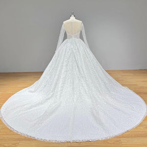 Crystal Beaded Shining Ball Gown Wedding Dress with Long Sleeves and Illusion Back