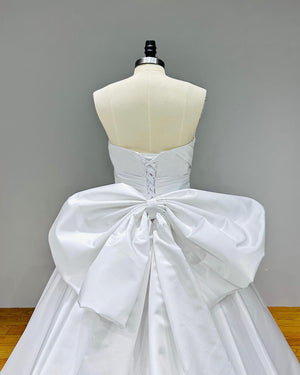 Light Effect Satin Ball Gown with Big Bow Chapel Train Pearls and Pleated Top