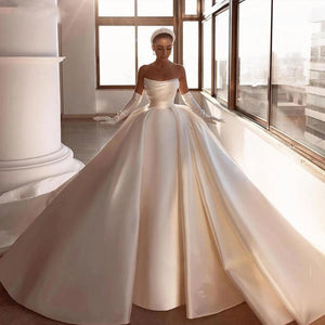 Light Effect Satin Ball Gown with Big Bow Chapel Train Pearls and Pleated Top