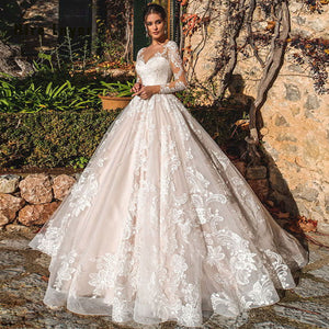 Long Sleeve Ball Gown Wedding Dress with Illusion Back and Sequined Appliques