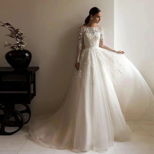 Elegant Tulle A-Line Wedding Dress with Satin Belt and Long Sleeves