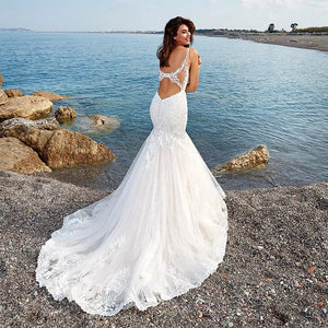 V-neck Mermaid Wedding Dress with Spaghetti Straps, Cut-out Back, and Ivory Tulle