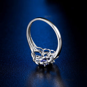 14K White Gold Flower Ring with Blue Tanzanite – December Birthstone