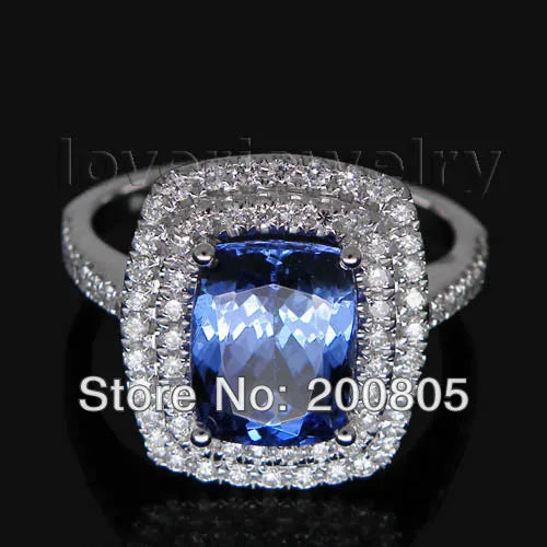 Vintage 18kt White Gold Ring with 7x10mm AAA Tanzanite and Natural Diamonds