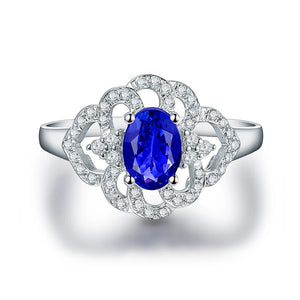 14K White Gold Flower Ring with Blue Tanzanite – December Birthstone