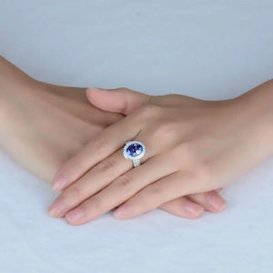 Antique 18kt White Gold Tanzanite Ring with Diamonds 9x12mm Oval AAAA