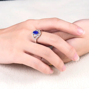 14K White Gold Flower Ring with Blue Tanzanite – December Birthstone