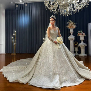 Luxury Beaded Ball Gown Wedding Dress with Long Sleeves and Elegant Detailing