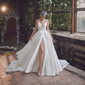 Elegant V-Neck Satin Wedding Dress with Slit Skirt and Pearl Beading for Modern Brides