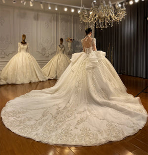 Customized Real Work Wedding Dress with Ruffles and Ball Gown Design