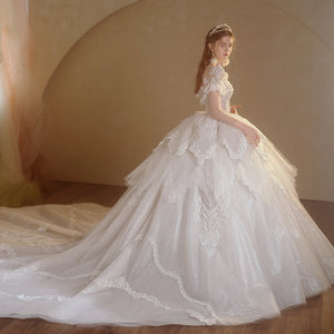 Romantic Organza O-Neck Full Sleeve Wedding Dress with Button Illusion Ruffles