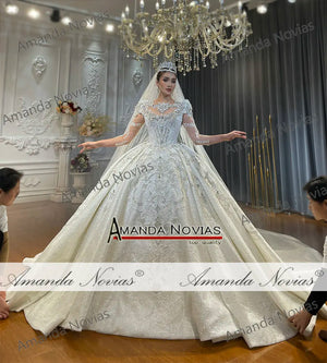 Customized Empire Lace Appliquéd Crystal Wedding Dress with Luxurious Detailing