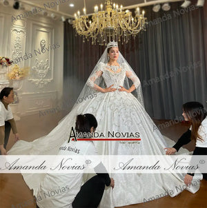 Customized Empire Lace Appliquéd Crystal Wedding Dress with Luxurious Detailing