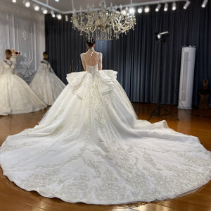 Customized Real Work Wedding Dress with Ruffles and Ball Gown Design