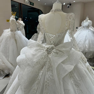 Elegant White Long Sleeve Wedding Dress with Court Train and Lace-Up Back