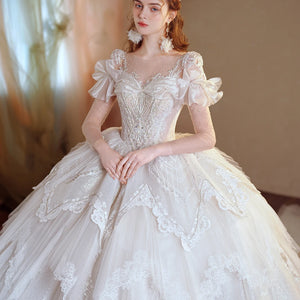 Romantic Organza O-Neck Full Sleeve Wedding Dress with Button Illusion Ruffles