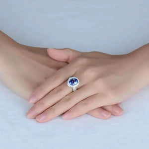 Antique 18kt White Gold Tanzanite Ring with Diamonds 9x12mm Oval AAAA