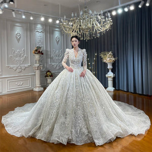 Customized Luxury Crystal Ball Gown Wedding Dress with Sparkling Embellishments