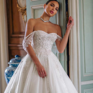 Off the Shoulder Tulle A-Line Wedding Dresses Beading Appliques Luxury Backless Bridal Gowns