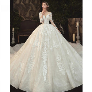 New Arrival O-Neck Long Sleeve Pearl Button Back Ball Gown Wedding Dress