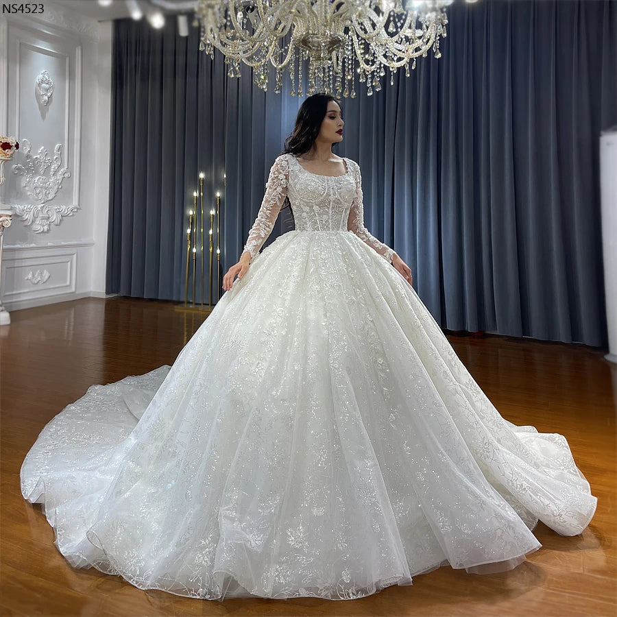 Elegant Lace Ball Gown Wedding Dress with Long Sleeves for Brides