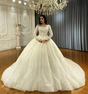 Elegant Lace Ball Gown Wedding Dress with Long Sleeves for Brides