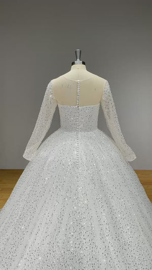 New Arrival Glitter Tulle Ball Gown Wedding Dress with Long Sleeves and Illusion Back