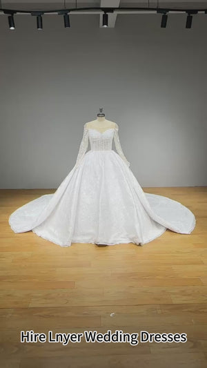 Long Sleeve Ball Gown Wedding Dress with Chapel Train and See-Through Top