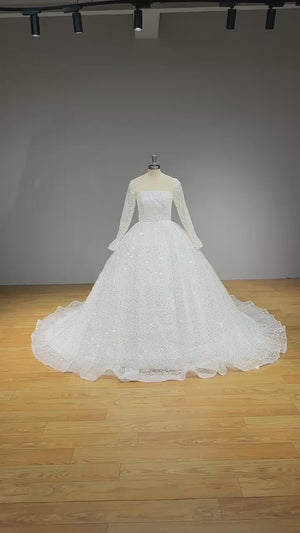 New Arrival Glitter Tulle Ball Gown Wedding Dress with Long Sleeves and Illusion Back